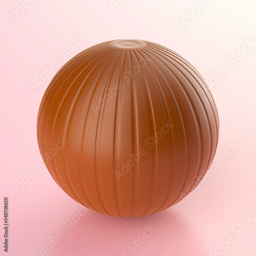 Chocolate ball on pink background