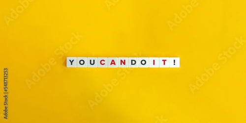 You Can Do It Motivational Phrase. Block Letter Tiles on Yellow Background. Minimal Aesthetics.