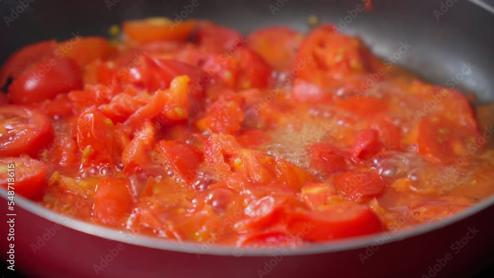 Hot ketchup or tomato sauce or soup while cooking traditional recipe organic food concept. Selective focus Hot ketchup or tomato sauce or soup while cooking traditional recipe organic food concept. Selective focus