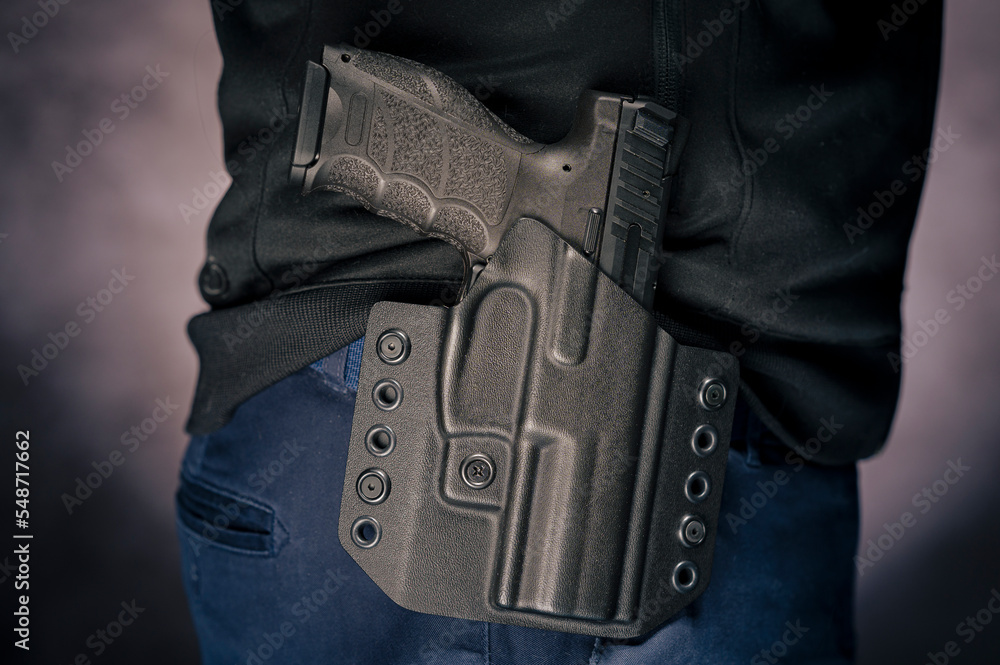 Handgun in the holster Stock Photo Adobe Stock