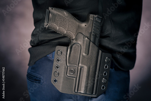 Handgun in the holster photo