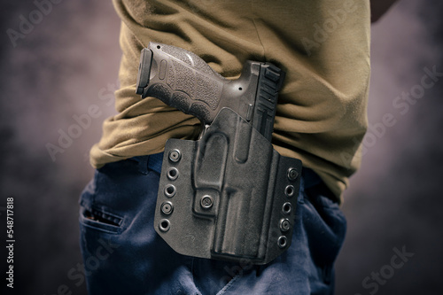 Handgun in the holster photo