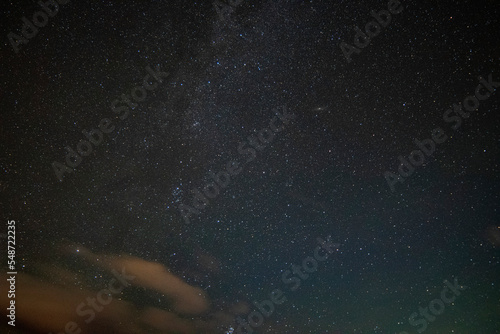 A night full of stars and some clouds. Night view of the sky many constellations