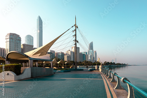 Abu Dhabi Skyline from Corniche. Abu Dhabi, Modern Skyscrapers and Landmark.Promenade in Abu Dhabi. United Arab Emirates, Middle East. 