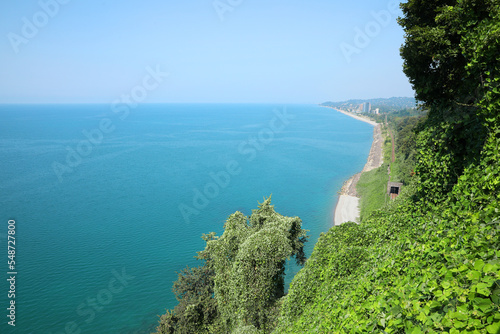 Picturesque view of green hills and sea