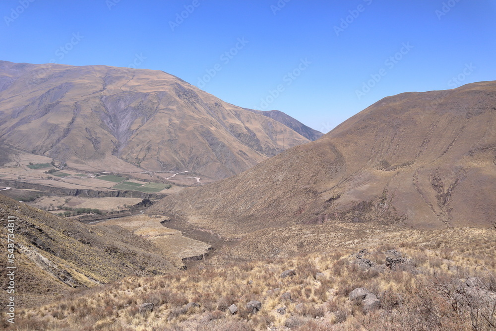 Road at Quebrada de Humahuaca valley, Argentina, with blue sky background Road at Quebrada de Humahuaca valley, Argentina, with blue sky background