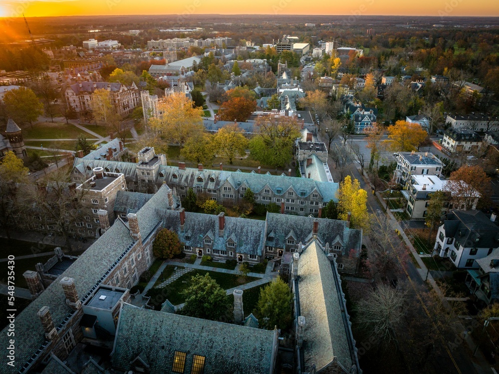 Drone view of golden sunrise over Princeton New Jersey. Cityscape with famous landmarks