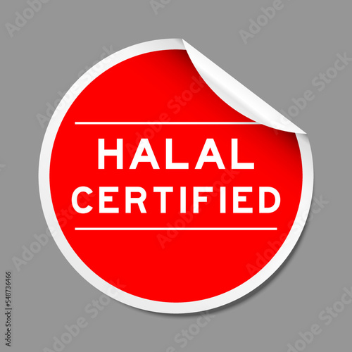 Red color peel sticker label with word halal certified on gray background