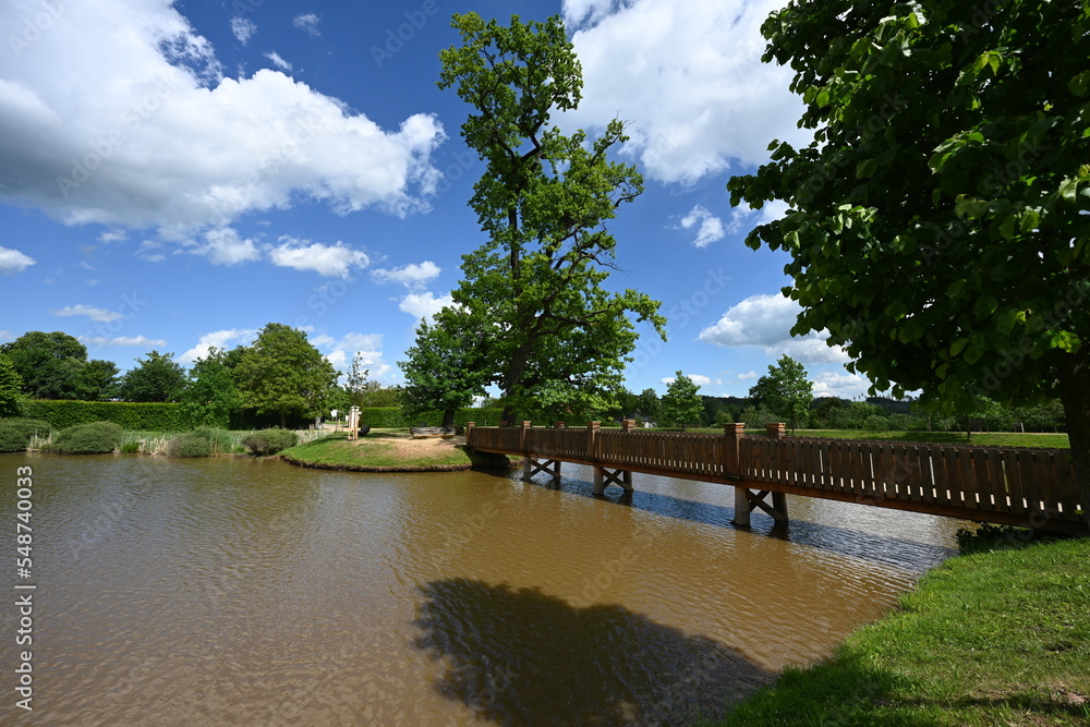Wooden bridge on pond in Panska Garden, Kunstat in Moravia, Czech Republic. Wooden bridge on pond in Panska Garden, Kunstat in Moravia, Czech Republic.