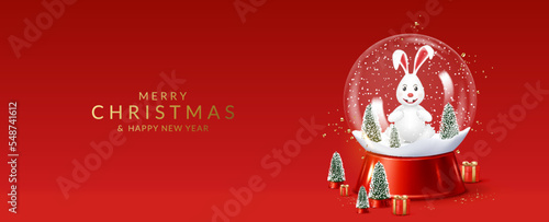 Christmas and New Year greeting card with transparent snow globe with cute rabbit.