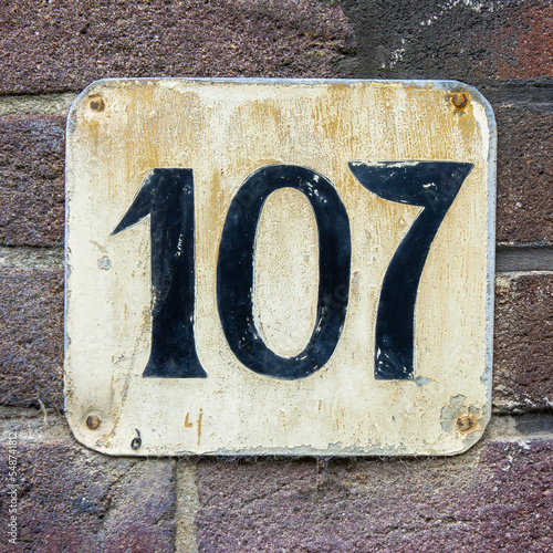 house number one hundred and seven (107)