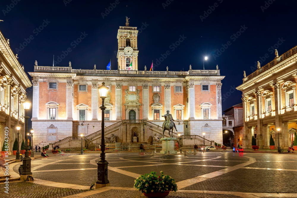 Statue of Marcus Aurelius and Conservators Palace (Palazzo dei Conservatori) on Capitoline Hill at night, Rome, Italy