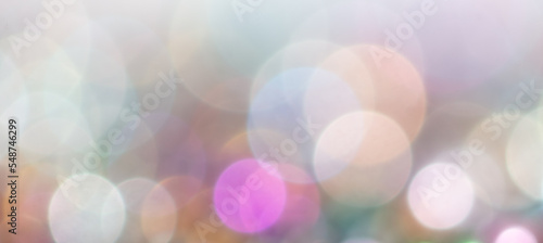 Multicolored festive bokeh as background.