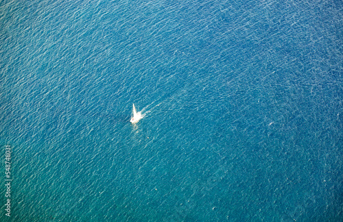 sailing vessel in the deep blue ocean