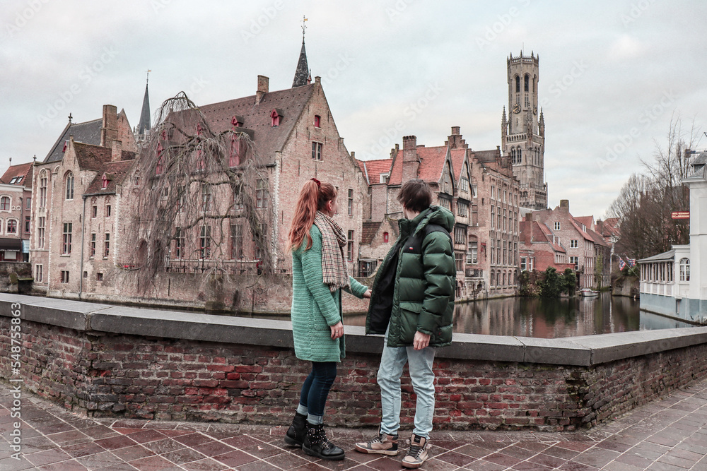 Fototapeta premium Couple enjoying the view in Bruges, Belgium.