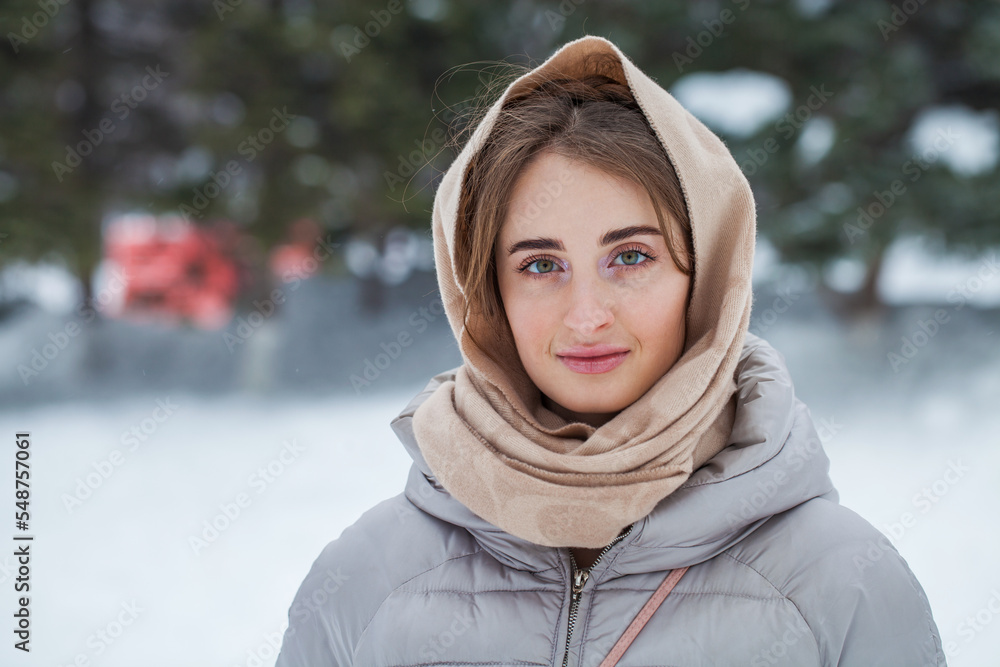 Close up portrait of young woman, winter park outdoors Close up portrait of young woman, winter park outdoors