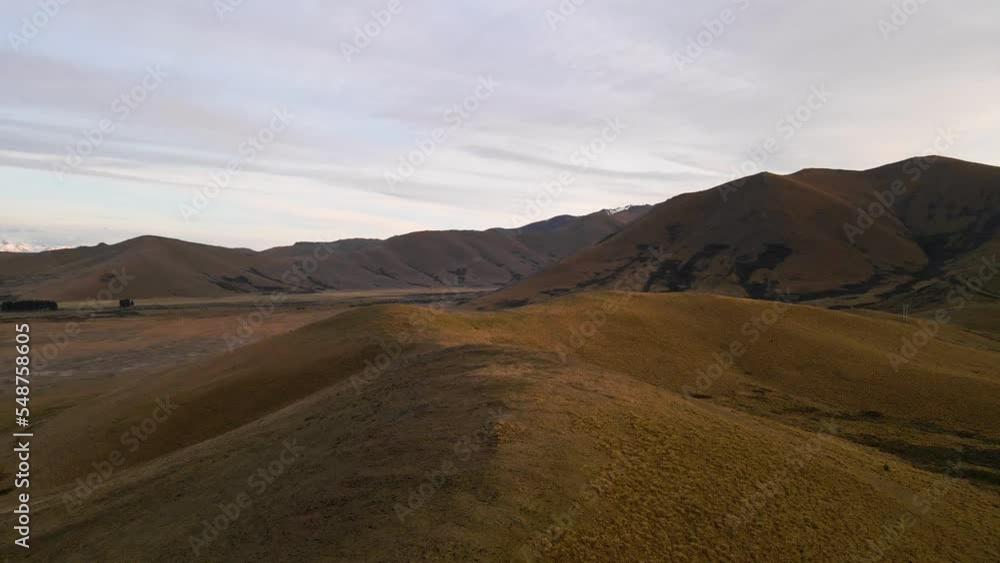 Aerial - vast, dry hills of the Mackenzie district of southern New Zealand Aerial - vast, dry hills of the Mackenzie district of southern New Zealand