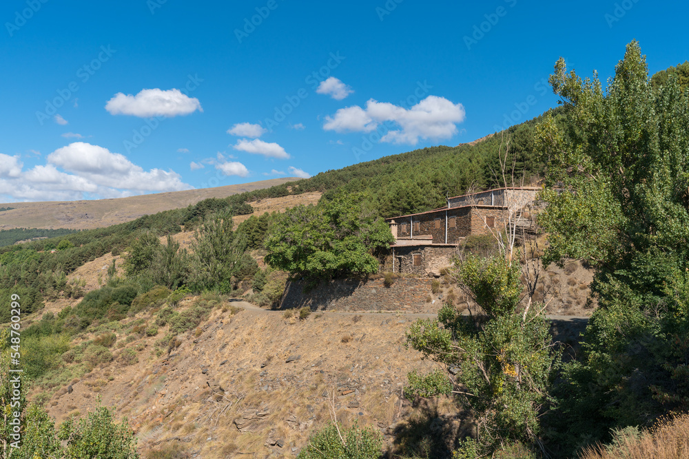 A farmhouse on the slope of the Sierra Nevada A farmhouse on the slope of the Sierra Nevada