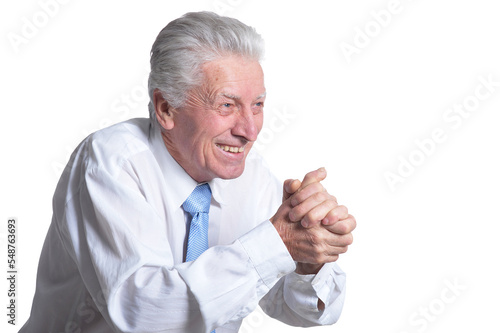 close up portrait of senior businessman in formal wear posing