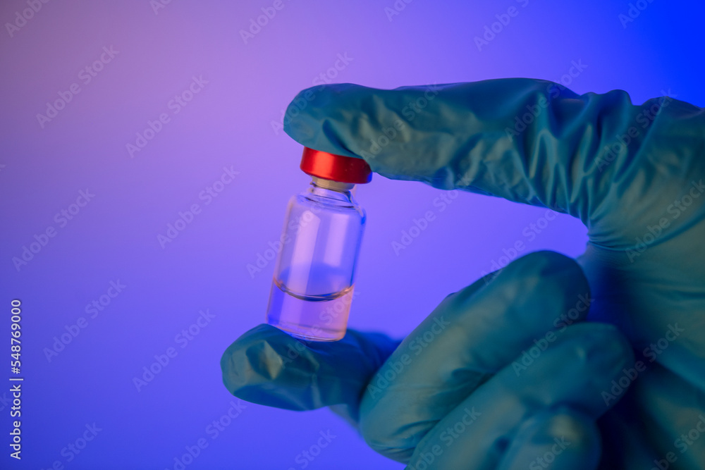 Medical hand glove blue vial vaccine hypodermic. Lab test immunization