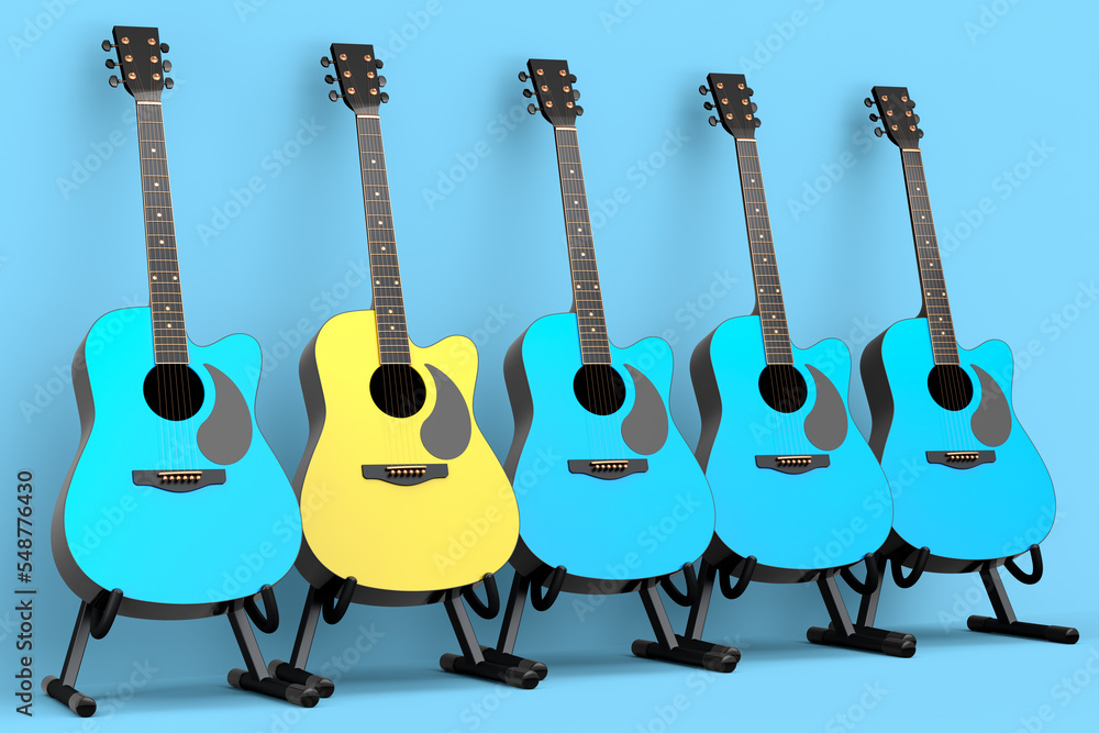 Fototapeta premium Set of acoustic guitar isolated on blue background.