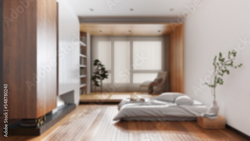 Blurred background  minimalist wooden bedroom. Bed with pillows and fireplace. Wallpaper and parquet floor. Japandi interior design