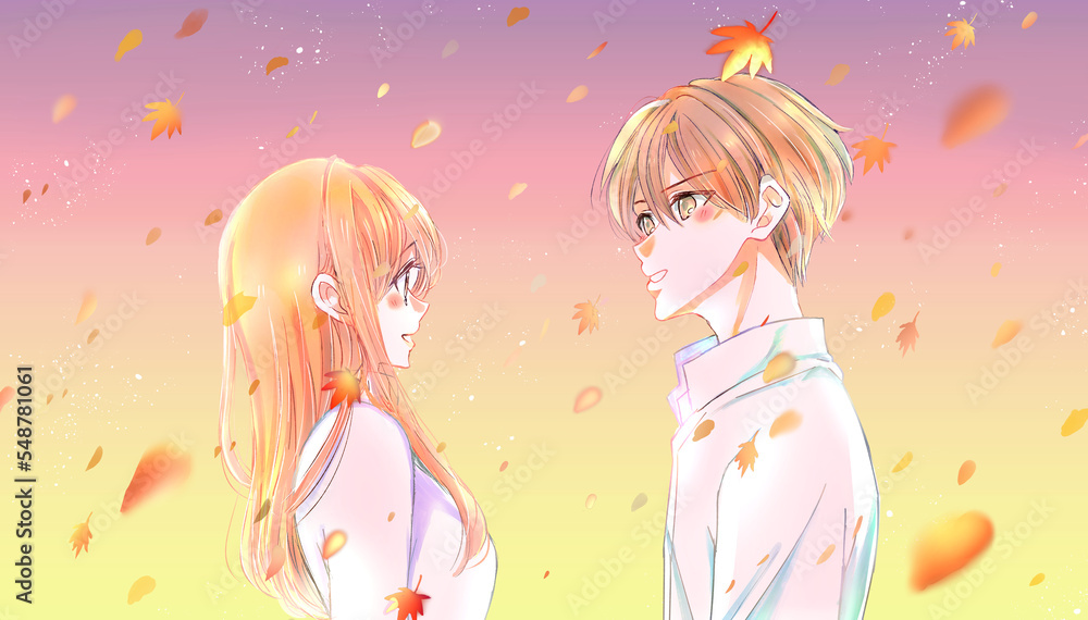 向かい合う男女カップル　紅葉　夕暮れ