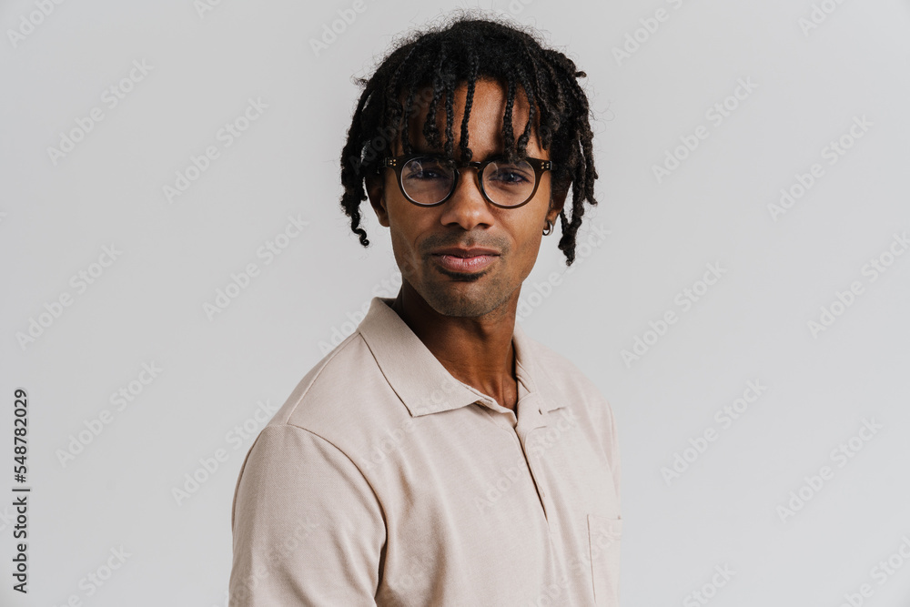 Young african man in eyeglasses looking at camera