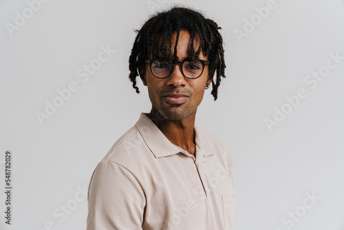 Young african man in eyeglasses looking at camera