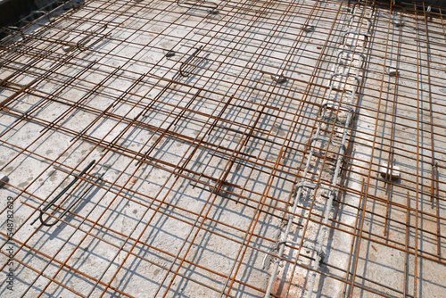 MELAKA  MALAYSIA -JULY 2  2022  Steel reinforcement bars are arranged according to the structural engineer s design. The steels are tied together using a small steel wire.