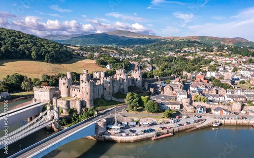 Aerial view with Conwy town and the medieval castle  the famous landmark of Wales and UK  captured in the morning