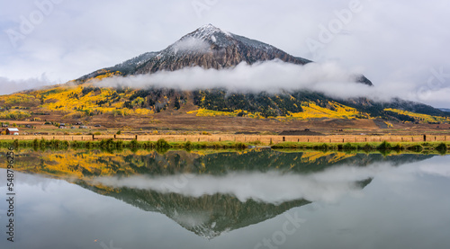 Crested Butte Mountain autumn aspen trees reflection from Rainbow Park in the town of Crested Butte photo