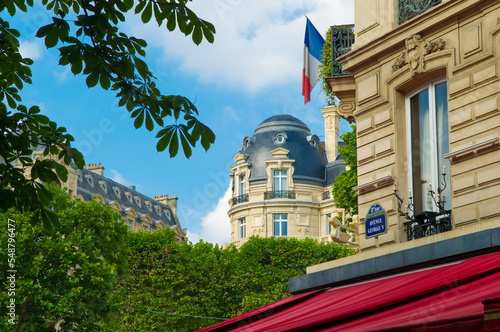 A view looking up from Avenue George V in Paris, France. photo