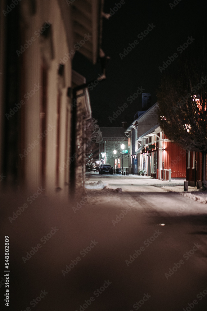 Snowy street in a small town at Christmas time Snowy street in a small town at Christmas time