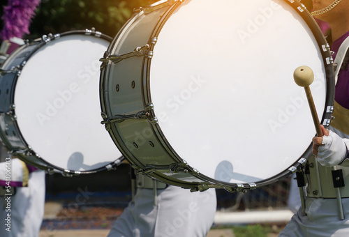 big drums, parade drums of the high school orchestra in the sports day parade. Soft and selective focus.  photo