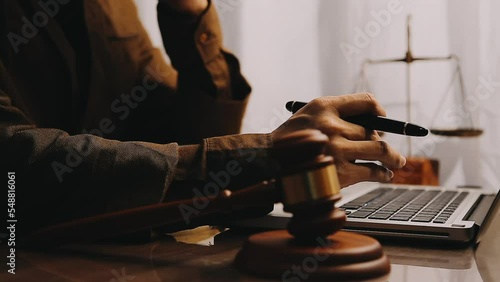 Wallpaper Mural justice and law concept.Male judge in a courtroom on wooden table and Counselor or Male lawyer working in office. Legal law, advice and justice concept. Torontodigital.ca