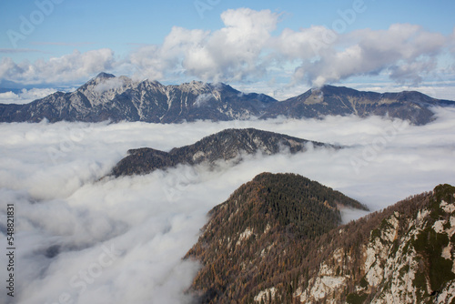 Julian Alps Slovenia  peak Debela Pec 2014 m  winter hiking in Triglav with snowy peaks and mist 