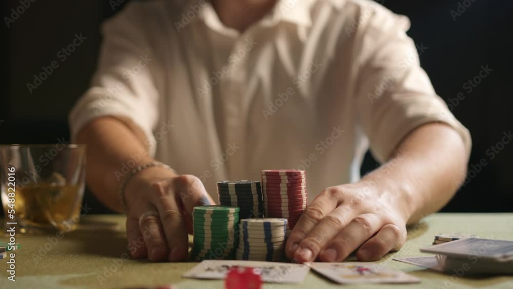 A poker player goes all-in. High quality 4k footage A poker player goes all-in. High quality 4k footage