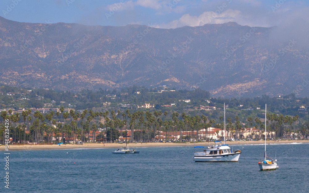 Sailboats standing in front of the coast of Santa Barbara, California, near Stearns Wharf. Sailboats standing in front of the coast of Santa Barbara, California, near Stearns Wharf.