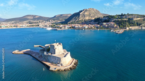 Aerial drone photo of iconic fortress of Bourtzi built in small islet in gulf of Argolida used as a prison in old times, Nafplio, Peloponnese, Greece photo