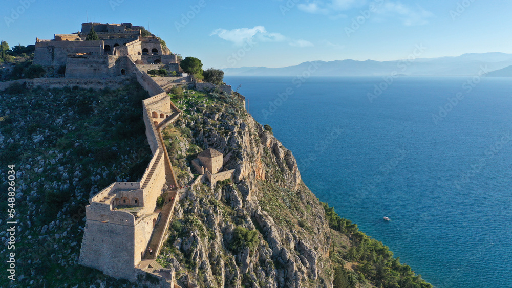 Aerial drone photo of iconic fortress of Palamidi built uphill overlooking old city of Nafplio well known for its 1000 stairs to reach the top , Argolida, Peloponnese, Greece