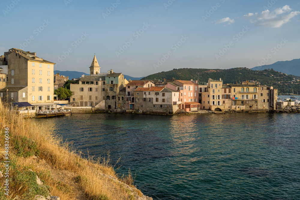 The scenographic village of Saint Florent (San Fiorenzo) on a summer afternoon, in Corse, France.