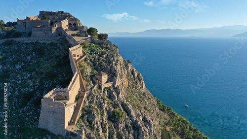 Obraz na płótnie Aerial drone photo of iconic fortress of Palamidi built uphill overlooking old city of Nafplio well known for its 1000 stairs to reach the top , Argolida, Peloponnese, Greece w salonie