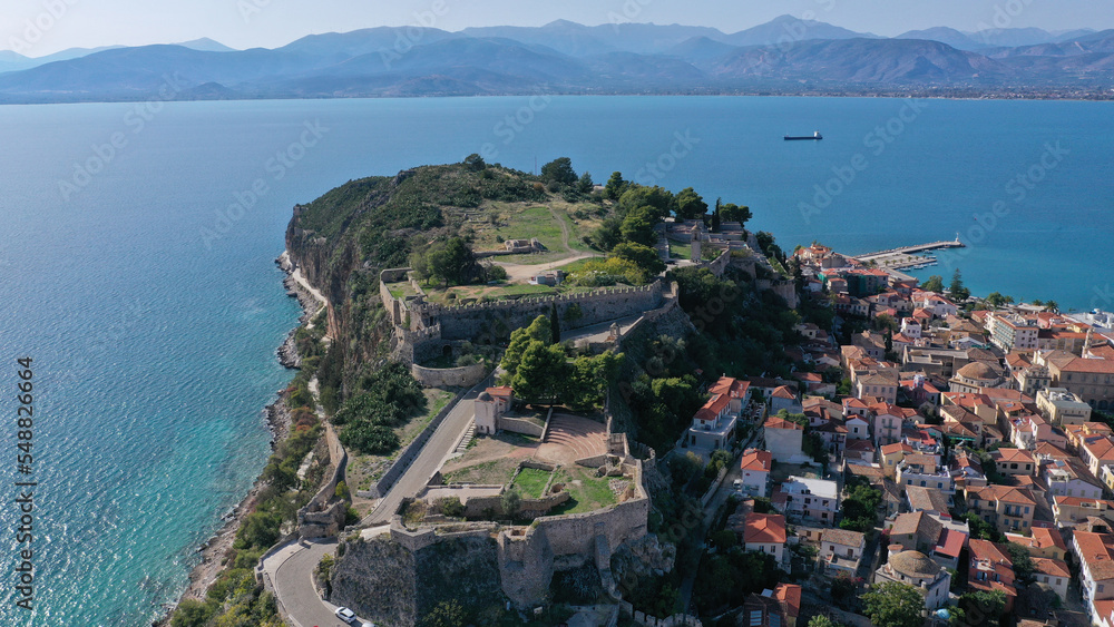 Aerial drone photo of famous scenic fortified rock known as Acronafplia overlooking old city of Nafplio, Argolida, Peloponnese, Greece