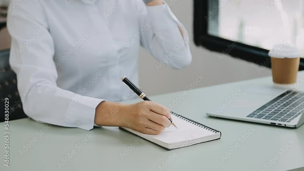 Businessman working with smart phone and laptop and digital tablet computer in office with digital marketing media in virtual icon Businessman working with smart phone and laptop and digital tablet computer in office with digital marketing media in virtual icon