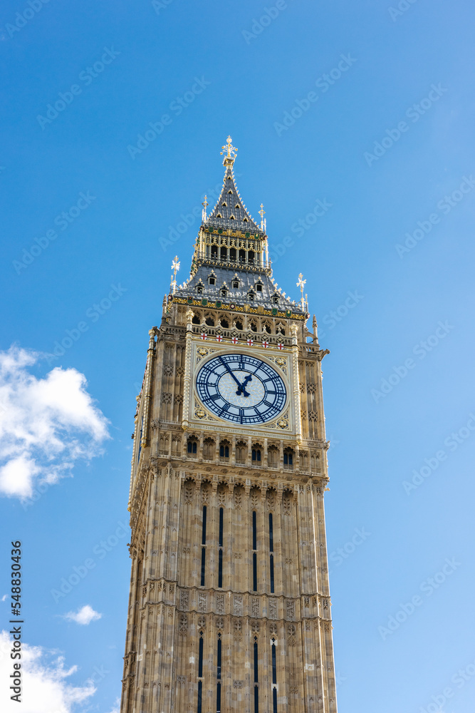 The famous Big Ben clock tower against a blue sky in London, England	
