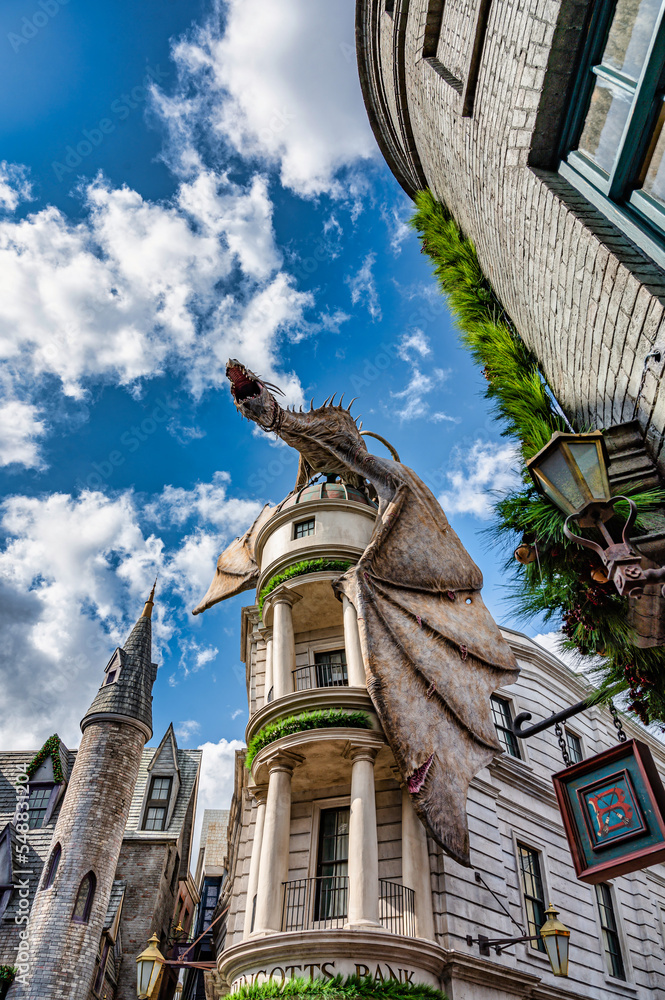 Naklejka premium Orlando, Florida, United States. November 15 2022. Harry Potter Diagon Alley attraction at Universal Studios with Christmas season decorations.