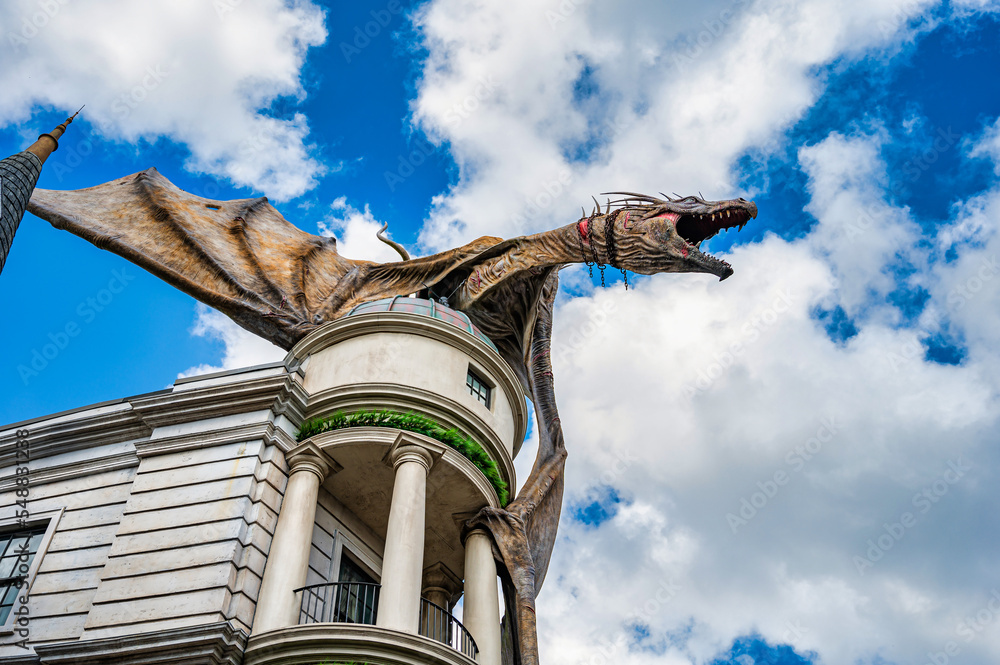 Fototapeta premium Orlando, Florida, United States. November 15 2022. Harry Potter Diagon Alley attraction at Universal Studios with Christmas season decorations.