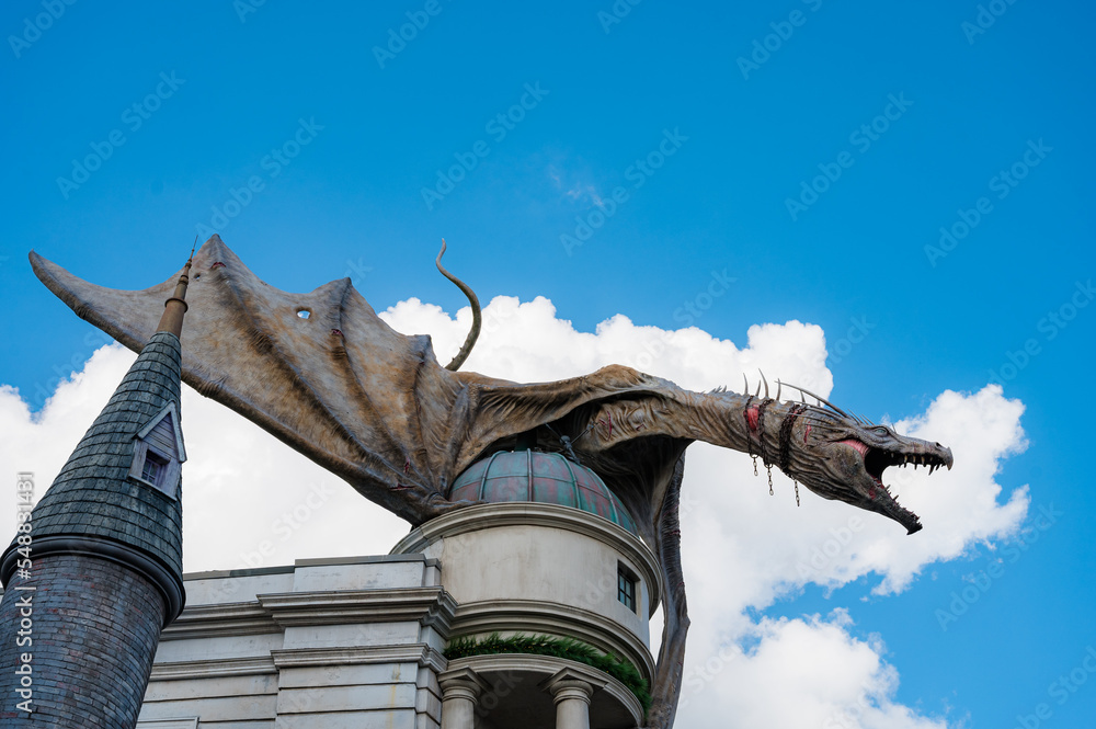 Fototapeta premium Orlando, Florida, United States. November 15 2022. Harry Potter Diagon Alley attraction at Universal Studios with Christmas season decorations.