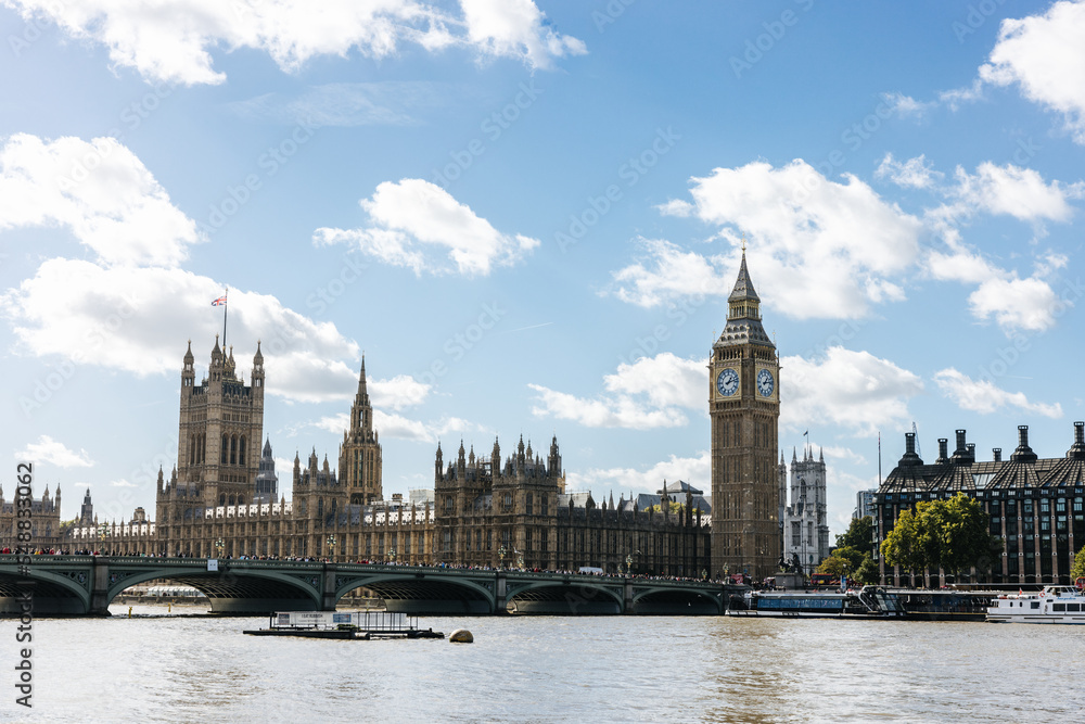 The famous Big Ben and the English Parliament along the river Thames in London, England The famous Big Ben and the English Parliament along the river Thames in London, England